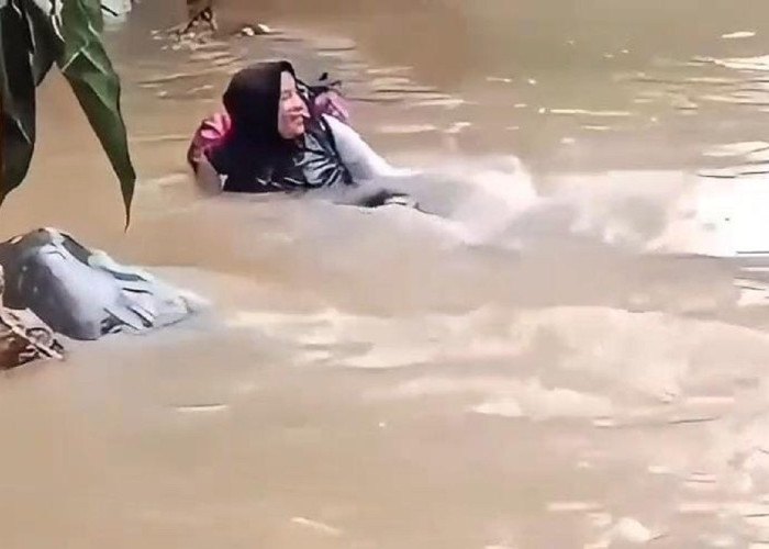 Bidan Dona Lubis Seberangi Sungai Deras Demi Pasien TBC, Aksi Heroiknya Viral dan Dapat Apresiasi Publik