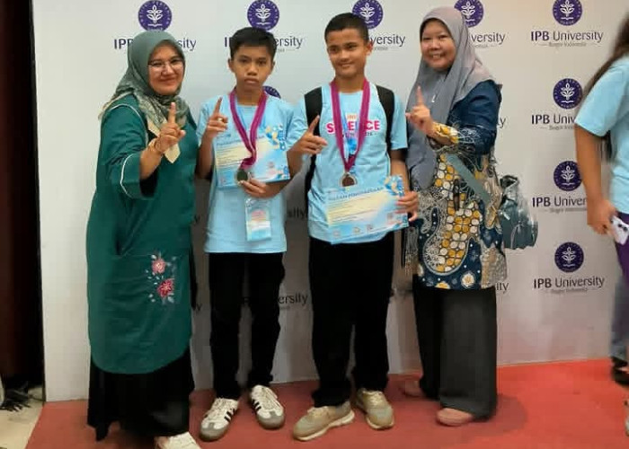Harumkan Nama Daerah, Dua Siswa SMPN 1 Kota Solok Raih Medali Perak Olimpiade Nasional